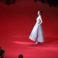  Marion Cotillard (robe Christian Dior) lors de la mont&eacute;e des marches du film L'homme qu'on aimait trop, 67e Festival de Cannes, le 21 mai 2014. 
