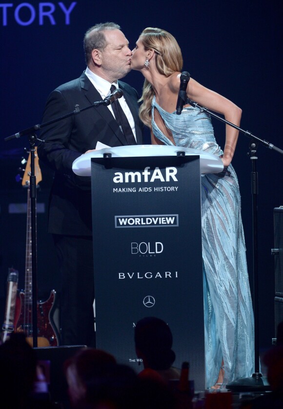 Heidi Klum embrasse Harvey Weinstein lors de la soirée "amfAR's 21st Cinema Against AIDS" à l'Eden Roc au Cap d'Antibes dans le cadre du 67ème festival du film de Cannes, le 22 mai 2014.