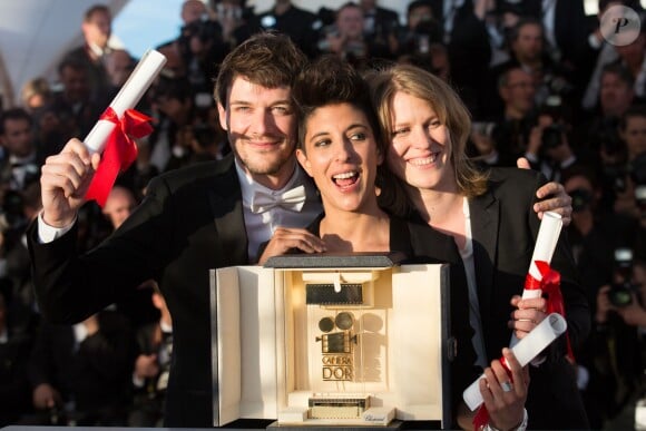 Samuel Theis, Marie Amachoukeli-Barsacq, Claire Burger, Caméra d'or pour "Party Girl" -- Photocall de la remise des prix du 67e Festival du film de Cannes le 24 mai 2014.