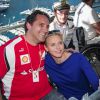 Charlene de Monaco était habillée en bleu lors de sa rencontre avec les membres de l'Association monégasque des Handicapés moteurs le 23 mai 2014 à l'occasion du Grand Prix de F1 de Monaco.
