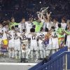 Les joueurs du Real Madrid fêtent la victoire en Ligue des champions au stade Bernabeu à Madrid en Espagne le 25 mai 2014. 