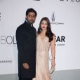 Aishwarya Rai et son mari Abhishek Bachchan lors du gala de l'amfAR au Cap d'Antibes en marge du Festival de Cannes le 22 mai 2014