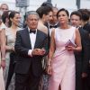 Christian Clavier et sa compagne Isabelle De Araujo (Bijoux APM Monaco) - Montée des marches du film "Jimmy's Hall" lors du 67e Festival du film de Cannes le 22 mai 2014. 