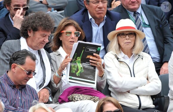 Robert Charlebois et sa femme Laurence, Mireille Darc à Roland-Garros à Paris, le 3 juin 2014.