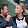 Clovis Cornillac et sa femme Lilou Fogli à Roland-Garros à Paris, le 3 juin 2014.