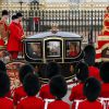 La reine Elizabeth II a étrenné son nouveau carrosse du jubilé de diamant flambant neuf, fabriqué par l'Australien Jim Frecklington, le 4 juin 2014 à l'occasion de l'inauguration du Parlement.