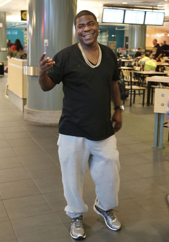Tracy Morgan et sa petite amie Megan Wollover en compagnie de leur fille Maven Morgan à l' aéroport de Vancouver Le 30 mai 2014