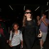 Angie et Zahara - Angelina Jolie et Brad Pitt décolent du LAX avec leurs enfants Maddox et Zahara, Los Angeles, 6 juin 2014.