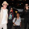 Please hide children's faces prior to the publication - Angelina Jolie and Brad Pitt make their way through LAX as they arrive with Maddox and Zahara for a departing flight out of Los Angeles. The family was accompanied by there security as fans and onlookers tried to snap pictures and say hello. Brad wore a beige blazer with matching pants and a fedora while his beautiful wife Angelina went with an all black ensemble. Los Angeles, CA, USA on June 6, 2014. Photo by GSI/ABACAPRESS.COM07/06/2014 - Los Angeles