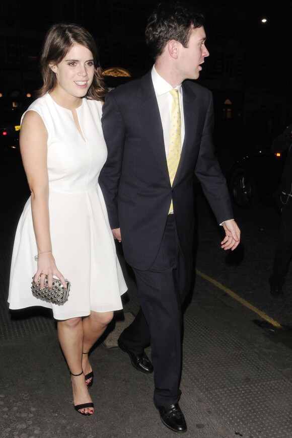 La princesse Eugenie d'York et son compagnon Jack Brooksbank quittent le club Tonteria après la soirée privée de Justin Timberlake dans la nuit du 10 au 11 juin 2014 à Londres.