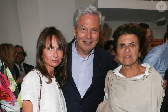 Axelle Laffont, Pierre Houzé (Président du directoire du groupe Galeries Lafayette) et sa femme - Opening party du BHV Marais section homme au BHV Marais à Paris, le 11 juin 2014.