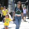 Alessandra Ambrosio et sa fille Anja, habillées aux couleurs du Brésil, se rendent au Rock and Reilly's Irish Pub pour regarder la cérémonie et le match d'ouverture de la Coupe du Monde. West Hollywood, le 12 juin 2014.