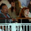 Bruce Springsteen et sa femme Patti Scialfa (derrière eux, Marina Hands) dans les tribunes du Stade des Hespérides le 12 juin 2014, au premier soir du Jumping international de Cannes, encourageant leur fille Jessica Springsteen. Hélas, la jeune cavalière de 21 ans n'a pas joué les premiers rôles.