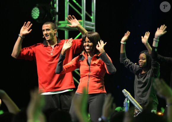 Colin Kaepernick danse avec Michelle Obama le 28 février 2013 à Chicago