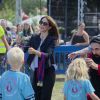 La princesse Mary de Danemark était samedi 14 juin 2014 au Faelledparken pour soutenir une course en relais contre les intimidations et remettre les médailles aux jeunes participants à leur arrivée.