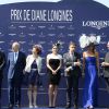 Eric Woerth (maire de Chantilly), Bertrand Bélinguier, Kate Winslet, Sophie Thalmann lors du 165e "Prix de Diane Longines" à l'hippodrome de Chantilly le 15 juin 2014.