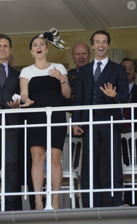 Kate Winslet et son mari Ned Rocknroll assistent au 165e "Prix de Diane Longines" à l'hippodrome de Chantilly le 15 juin 2014.