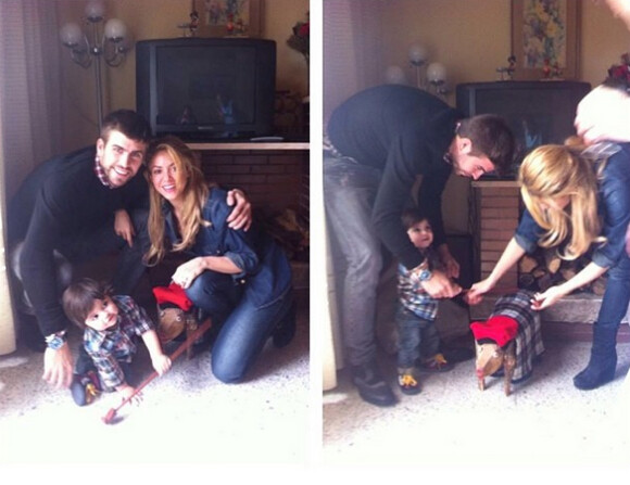 Shakira, Gerard Piqué et leur petit Milan, 11 mois, au pied du sapin de Noël, le 25 décembre 2013.