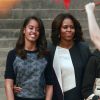 Michelle Obama entourée de ses filles Malia et Sasha lors de son voyage en Chine en mars 2014