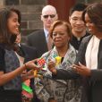  Michelle Obama entour&eacute;e de ses filles Malia et Sasha lors de son voyage en Chine en mars 2014 