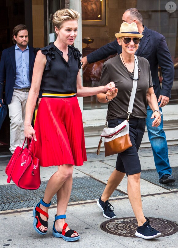Ellen DeGeneres et sa femme Portia de Rossi font du shopping dans les rues de New York, le 19 juin 2014.
