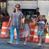 L'ancienne compagne de feu Philip Seymour Hoffman, Mimi O'Donnell, avec leurs filles Tallulah (8 ans) et Willa (6 ans) à New York le 21 juin 2014