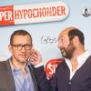 Dany Boon et Kad Merad lors du photocall du film "Supercondriaque" à Berlin, le 31 mars 2014. 