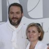 Bruce Toussaint et sa femme Catherine lors de la 4ème édition du "Brunch Blanc" sur le bateau Le Paquebot à Paris, le 29 juin 2014.