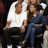 Jay-Z et sa femme Beyoncé assistent à un match de basket à New York le 12 mai 2014
