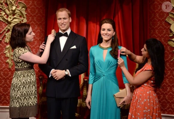 Le prince William et son épouse Kate Middleton représentés au Musée Madame Tussauds de Londres le 2 juillet 2014 