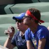 Laurent Ruquier et son compagnon Benoît assistent au match de la France contre l'Allemagne, à Rio de Janeiro, au Brésil, le 4 juillet 2014.