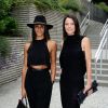 Shy'm et Laetitia Fourcade arrivent à la Salla Wagram pour assister au défilé haute couture de Franck Sorbier. Paris, le 9 juillet 2014.