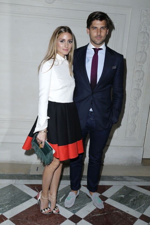 Olivia Palermo et son mari Johannes Huebl arrivent à l'hôtel Salomon de Rothschild pour assister au défilé Valentino haute couture automne-hiver 2014-2015. Paris, le 9 juillet 2014.