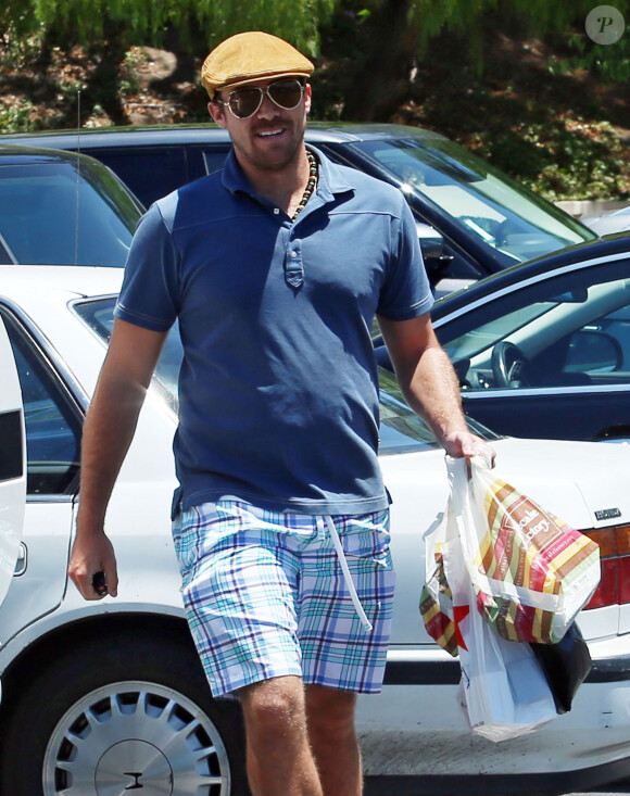 David Lucado fait du shopping dans un centre commercial de Los Angeles, le 13 juillet 2014.