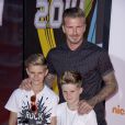 David Beckham, ses enfants Cruz Beckham et Romeo Beckham lors des Nickelodeon Kids' Choice Sports Awards à Los Angeles, le 17 juillet 2014.