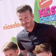 David Beckham avec ses enfants Cruz et Romeo lors des Nickelodeon Kids' Choice Sports Awards à Los Angeles, le 17 juillet 2014.