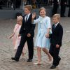 La princesse Eléonore, le prince Gabriel, la princesse héritière Elisabeth et le prince Emmanuel de Belgique arrivent pour assister au défilé militaire à l'occasion de la fête nationale belge, le 21 juillet 2014.