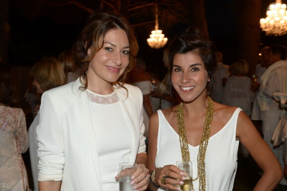 Shirley Bousquet et Reem Kherici lors de la 19e Soirée Blanche, le 14 juillet 2014 aux Moulins de Ramatuelle.