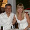 Nagui et sa compagne Mélanie Page lors de la 19e Soirée Blanche, le 14 juillet 2014 aux Moulins de Ramatuelle.