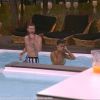 Jessica et Geoffrey toujours plus proches, dans la piscine, le 24 juillet 2014.
