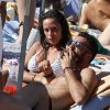 Raffaella Fico et son fiancé Gianluca Tozzi au Club 55 de Saint-Tropez, le 30 juillet 2014