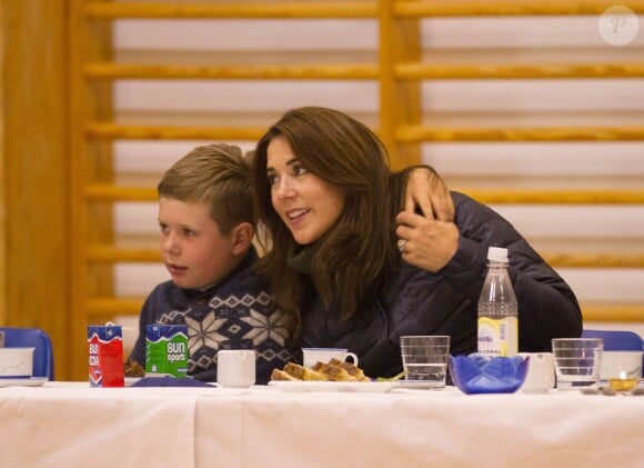 Alluitsup Paa, 02-08-2014: Crown Princess Mary and Prince Christian sit in the Kindergarten Muku in Alluitsup Paa during their 2nd day of the summer tour in Greenland. The Crown Prince of Denmark and his family visit Greenland from 1-8 August 2014 in connection with the summer cruise on the Royal Yacht. Photo by Albert Nieboer/RPE/DPA/ABACAPRESS.COM03/08/2014 - Igaliko
