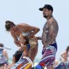 Exclusif - Cameron Diaz et son petit ami Benji Madden profitent des joies de la plage en amoureux avant d'aller faire quelques courses chez Whole Foods en Floride, le 3 juillet 2014.