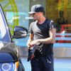 David Beckham remonte à bord de son 4*4 Range Rover à l'issue d'une séance de sport à la salle de gym Soul Cycle. Brentwood, Los Angeles, le 14 août 2014.