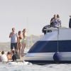 Après s'être baignée, Madonna a quitté le yacht où elle passe des vacances avec sa fille Lourdes Leon et des amis pour rejoindre la côte d'Ibiza, le 19 août 2014.