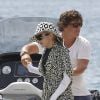 La chanteuse Madonna, bien entourée, et sa fille Lourdes Leon passent des vacances à Ibiza. Le 19 août 2014.