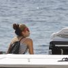 La chanteuse Madonna, bien entourée, et sa fille Lourdes Leon passent des vacances à Ibiza. Le 19 août 2014.