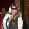 Mariah Carey quitte la boutique Vuitton lors d'une séance shopping à Aspen dans le Colorado, le 24 décembre 2013. 