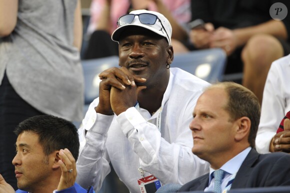 Michael Jordan lors du match entre Roger Federer et Marinko Matosevic lors du premier tour de l'US Open au Billie Jean King National Tennis Center de New York le 26 août 2014