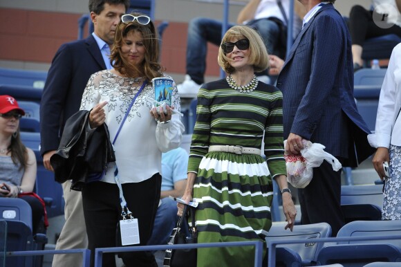 Anna Wintour et Mirka Federer à l'occasion du match de Roger Federer face à Marinko Matosevic lors du premier tour de l'US Open, à l'USTA Billie Jean King National Tennis Center de New York le 26 août 2014